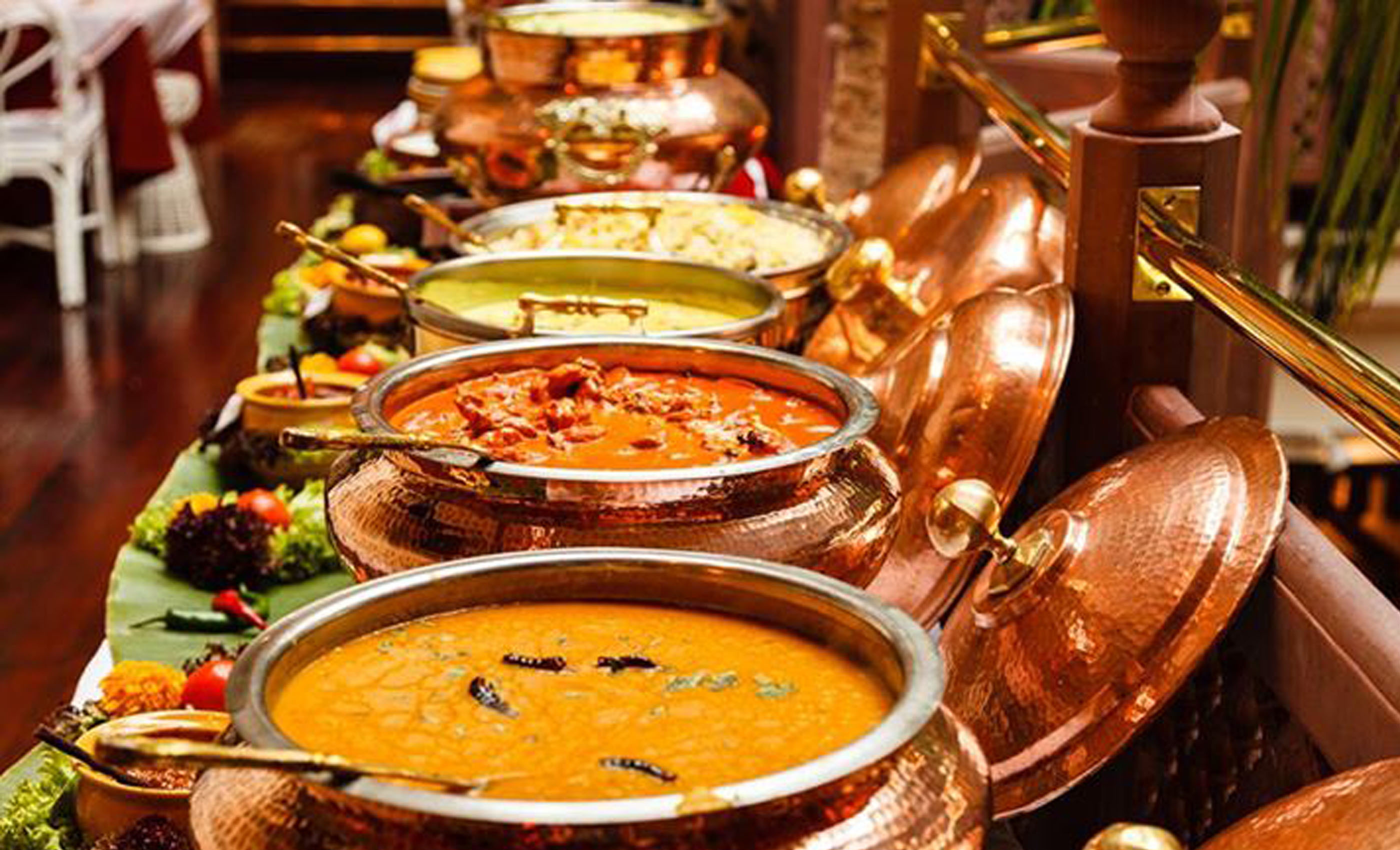 Copper buffet service pots arranged for an event