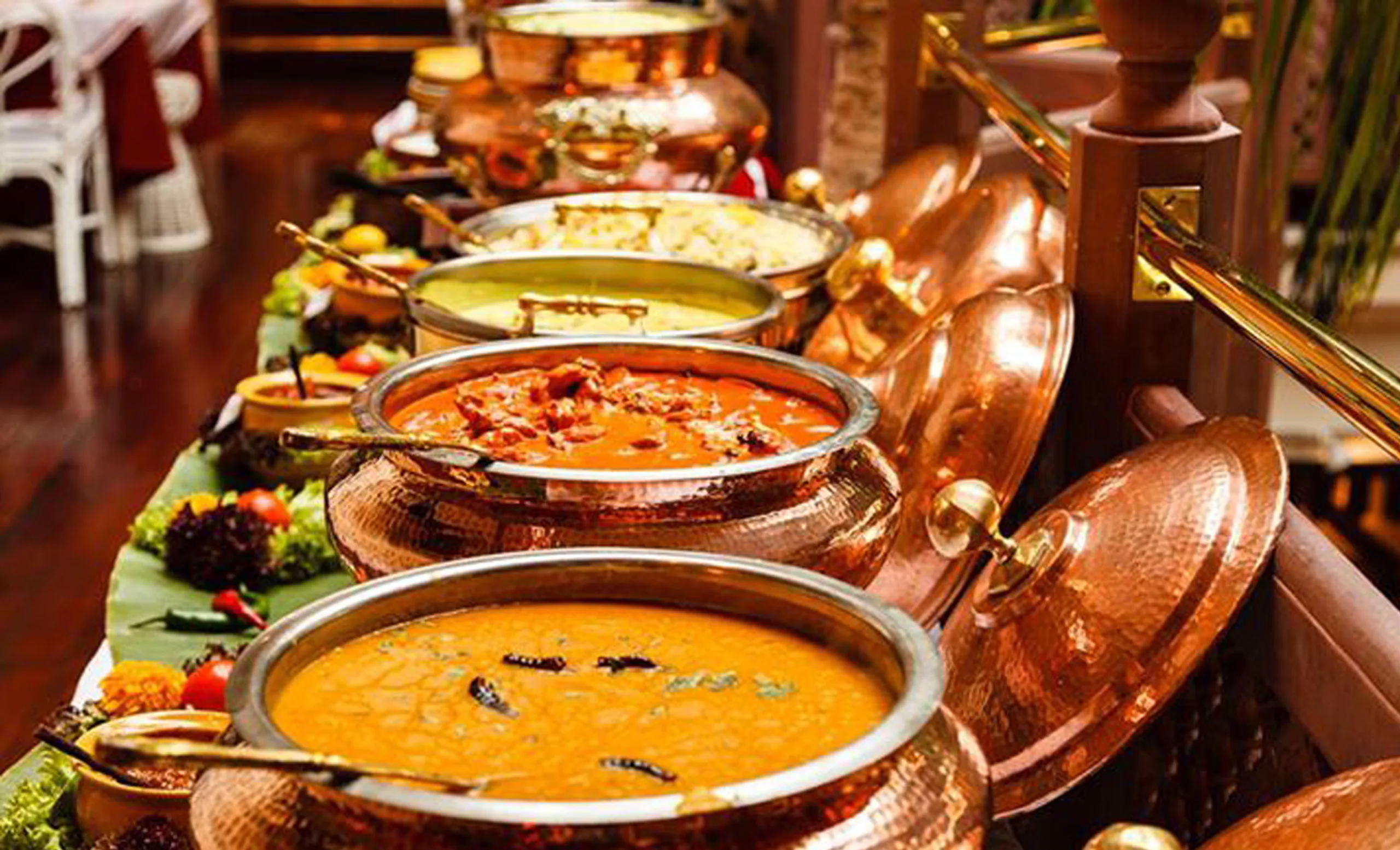 Copper buffet service pots arranged for an event